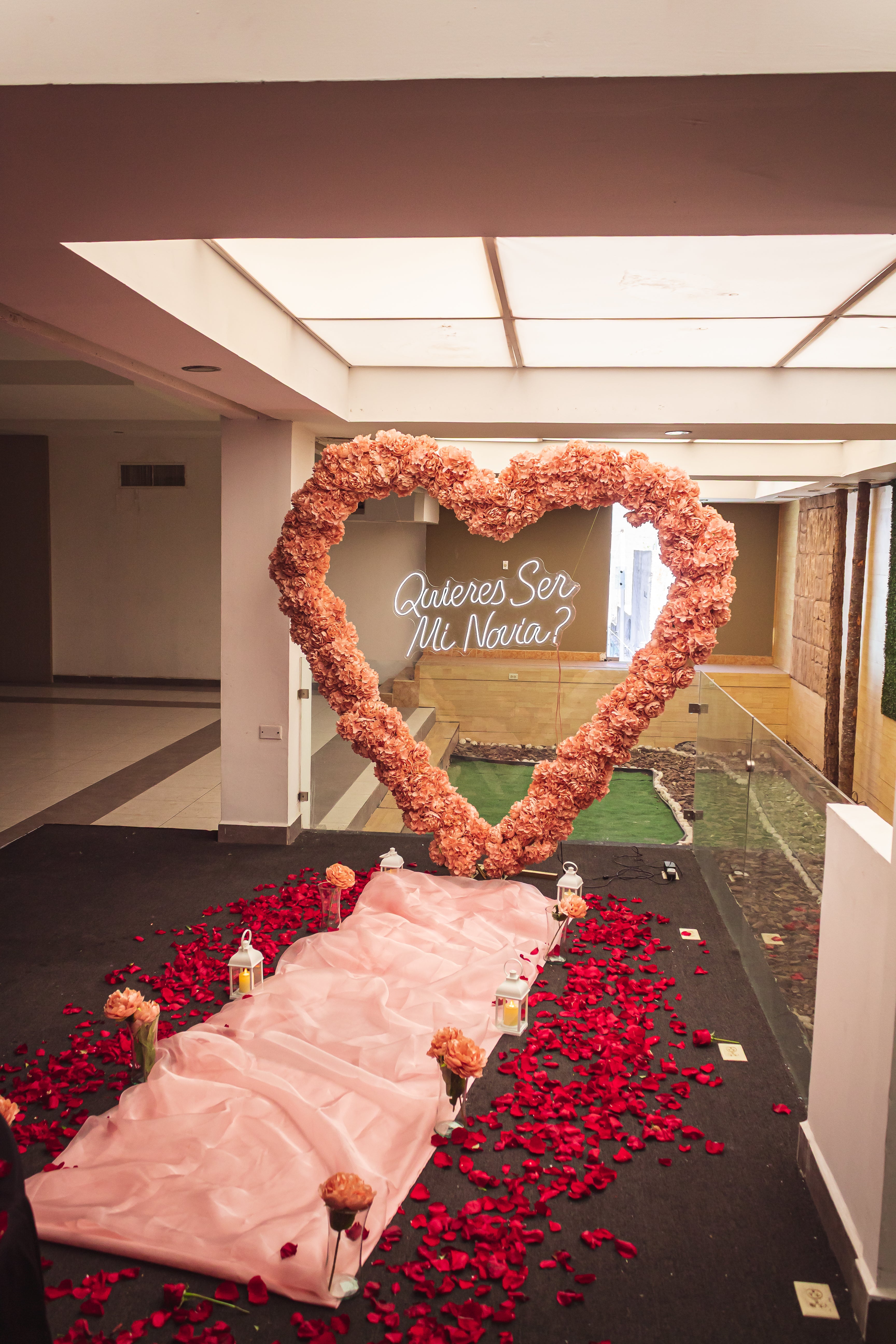 Corazón de flores rosa