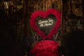 Corazón de flores rojo