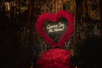Corazón de flores rojo