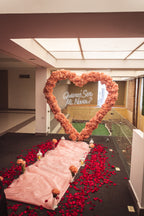 Corazón de flores rosa